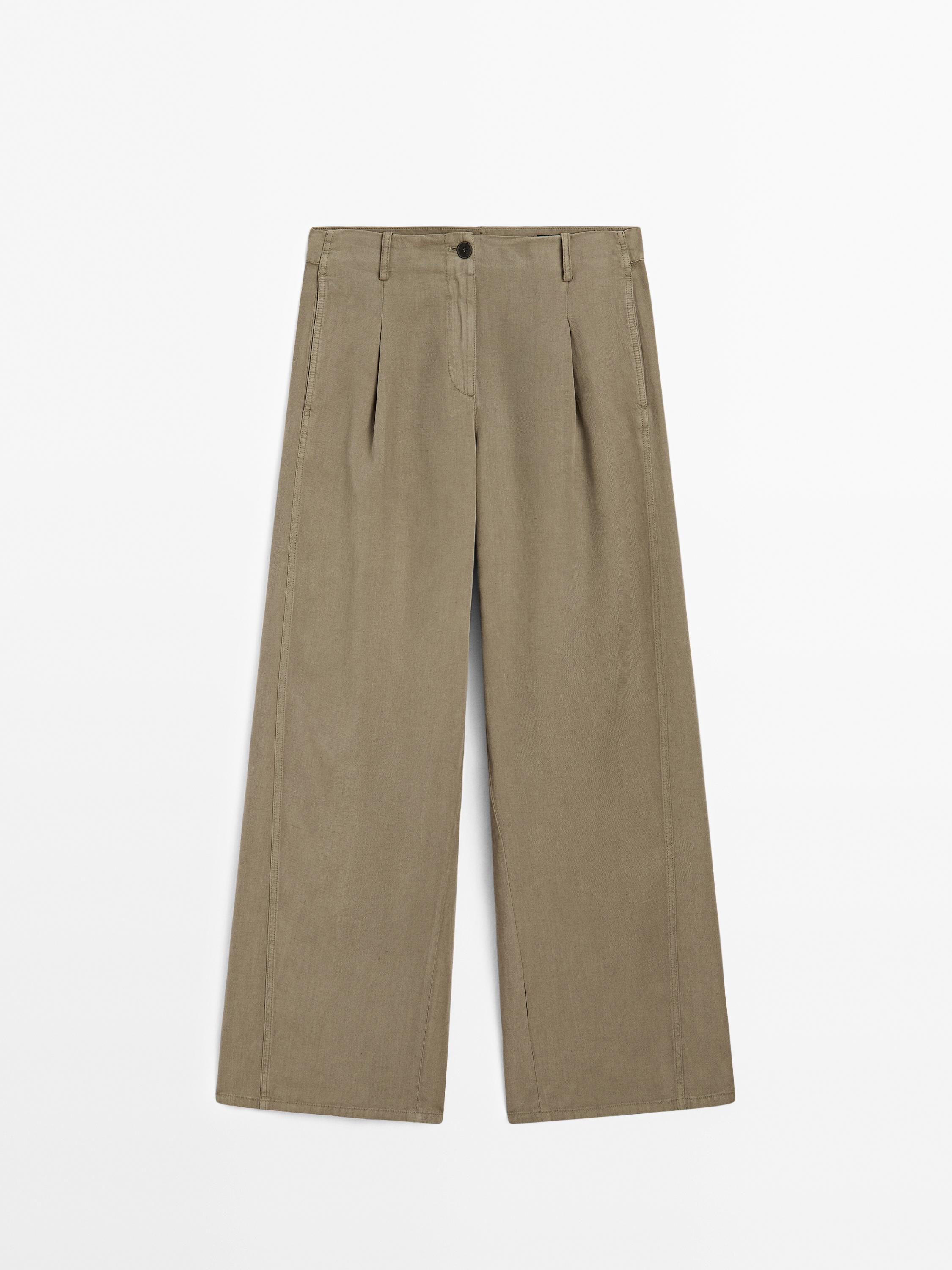 Flowing barrel fit trousers with seam detail